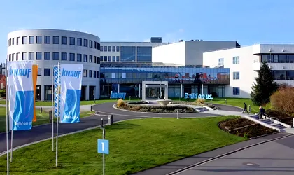 Knauf Gips Romania invests €88 million in a new gypsum wallboard plant in Cluj County, Romania, with 30Mm²/yr capacity, expected to start by end of 2027. The facility will integrate photovoltaic panels for sustainability. Industry brief.